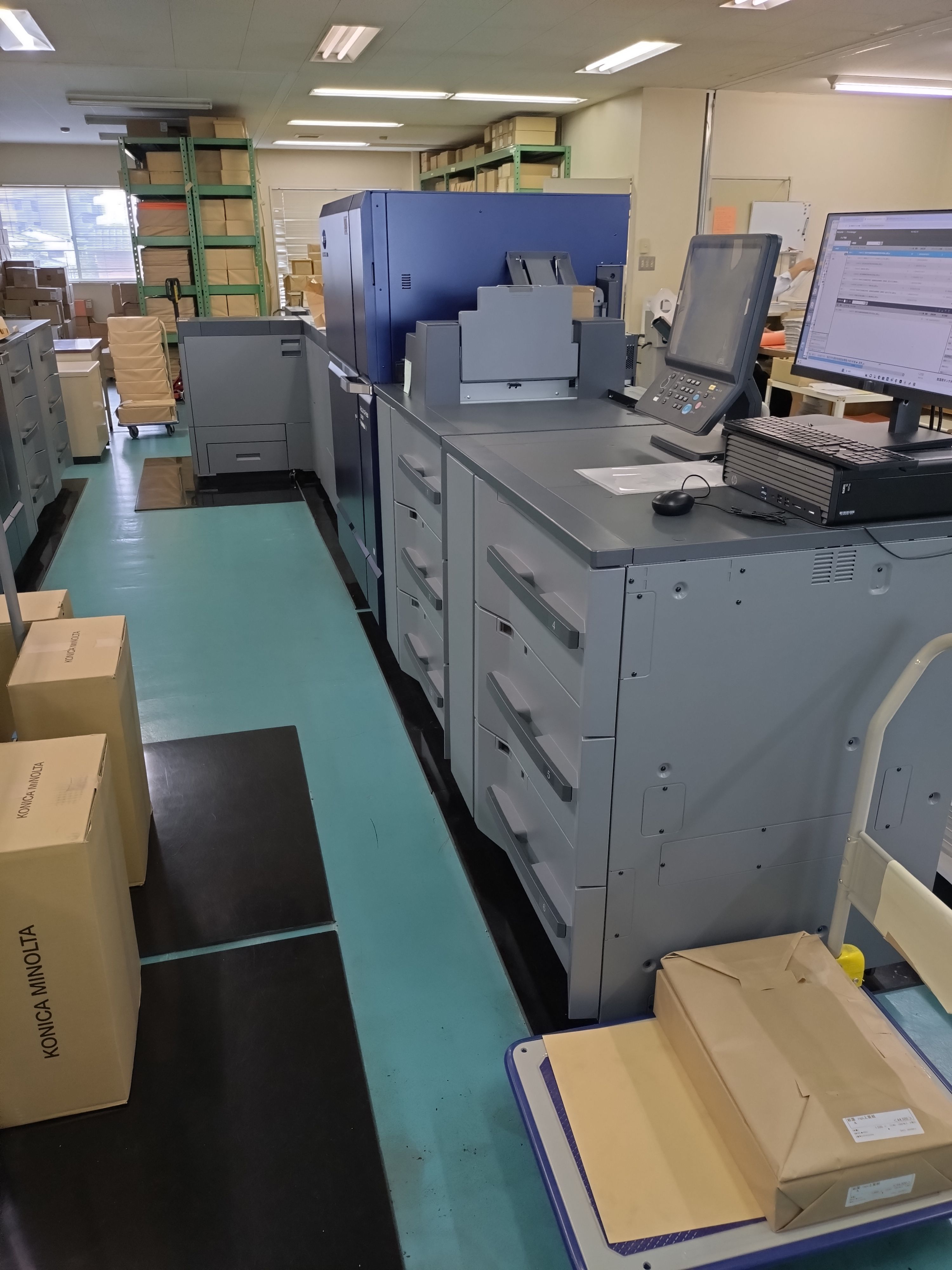 株式会社美巧社木太工場のオンデマンドプリンター（カラー）